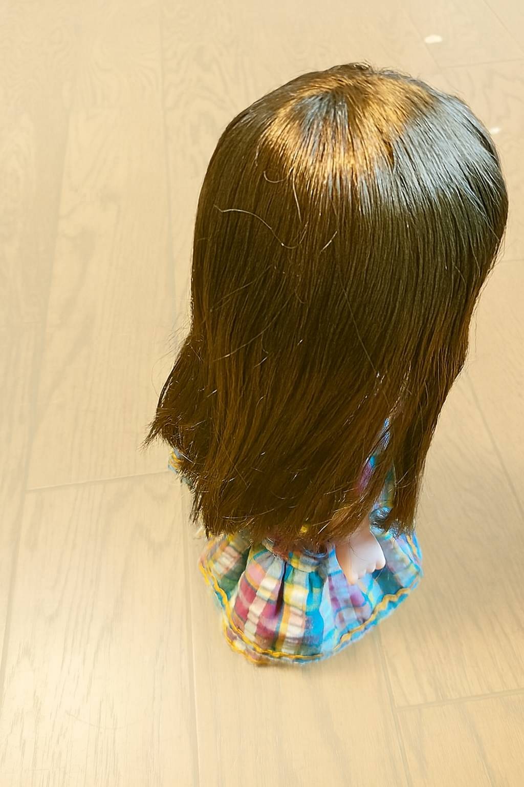 つやのあるきれいな髪の毛になったお人形さん